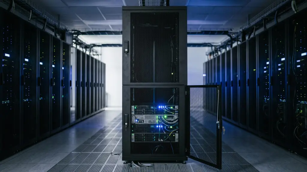 A rack split into two locked compartments, with the lower door ajar on a few servers